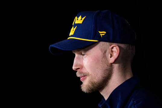 Elias Pettersson of Sweden being interviewed by media