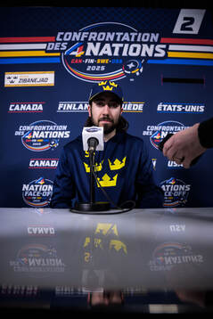 Mika Zibanejad of Sweden being interviewed by media
