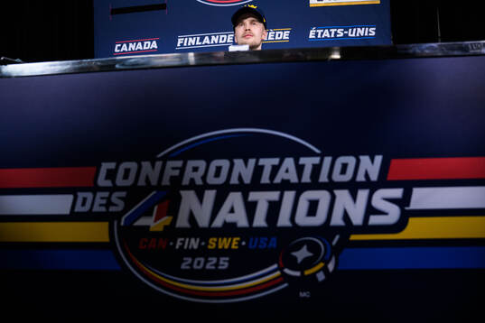 Elias Pettersson of Sweden being interviewed by media