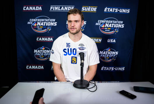 Aleksander Barkov of Finland is being interviewed by media