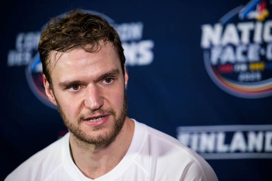 Aleksander Barkov of Finland is being interviewed by media