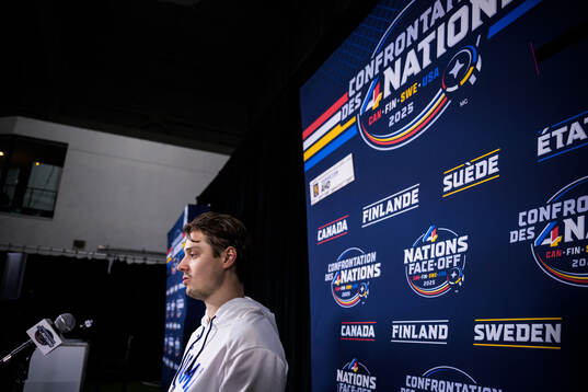Sebastian Aho of Finland is being interviewed by media