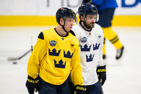 Jesper Bratt and Rasmus Andersson of Sweden at a practice