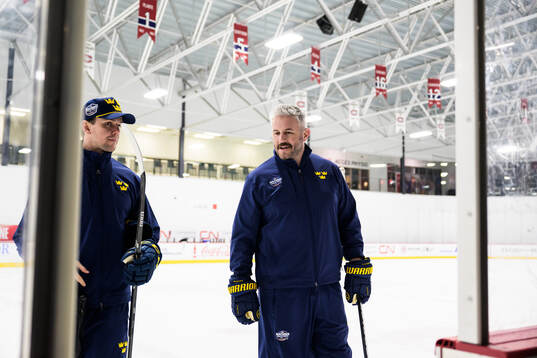 Goaltender coach Anthon Hansson and scouting coach Myles