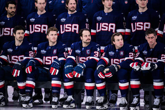 Auston Matthews and his teammates of USA pose for a team
