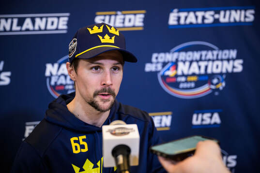 Erik Karlsson of Sweden is being interviewed by media