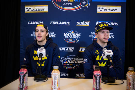 Leo Carlsson and Lucas Raymond of Sweden is being