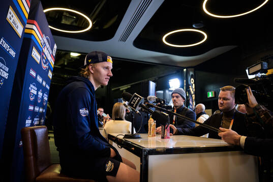 Rasmus Dahlin of Sweden is being interviewed by media