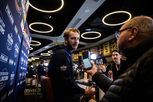 Goalkeeper Linus Ullmark of Sweden is being interviewed by