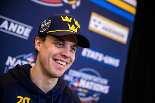 Joel Eriksson Ek of Sweden is being interviewed by media