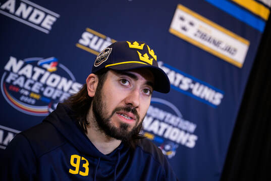 Mika Zibanejad of Sweden is being interviewed by media