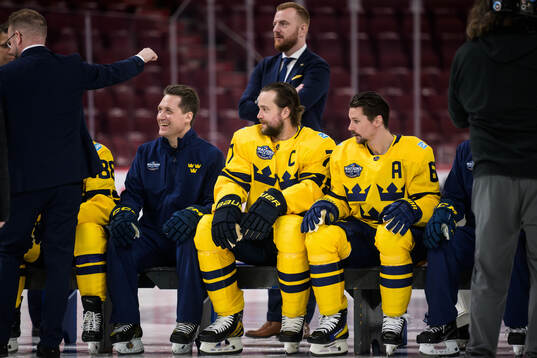 Head coach Sam Hallam, Victor Hedman and Erik Karlsson of