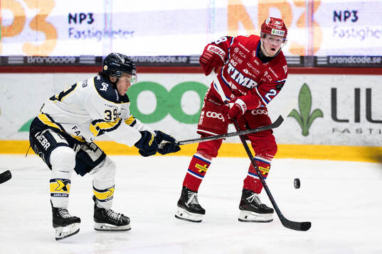 Timrås Simon Forsmark och HV71s Jamiro Reber