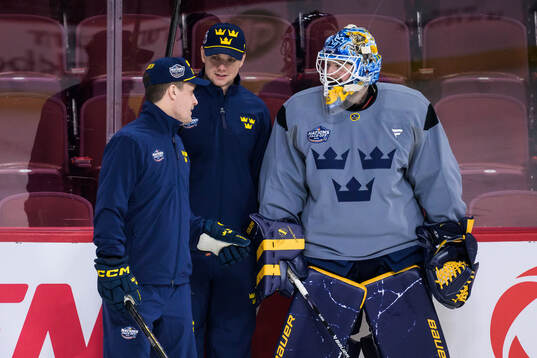 Head coach Sam Hallam, goaltender coach Anthon Hansson and