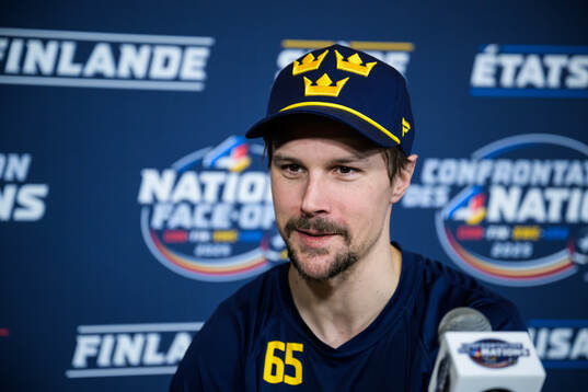 Erik Karlsson of Sweden is being interviewed by media