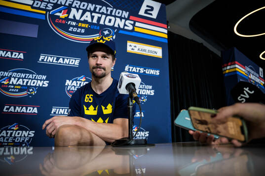 Erik Karlsson of Sweden is being interviewed by media