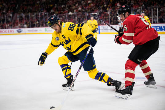 William Nylander of Sweden and Devon Toews of Canada