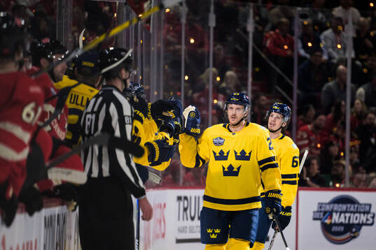Jonas Brodin of Sweden celebrates
