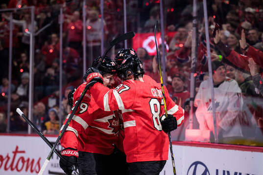 Nathan MacKinnon, Mark Stone and Sidney Crosby of Canada