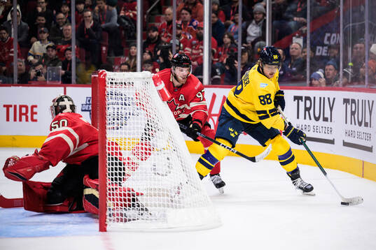Goaltender Jordan Binnington and Connor McDavid of Canada