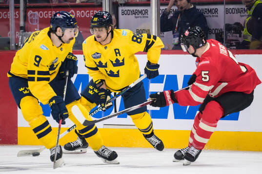 Filip Forsberg and William Nylander of Sweden and Devon
