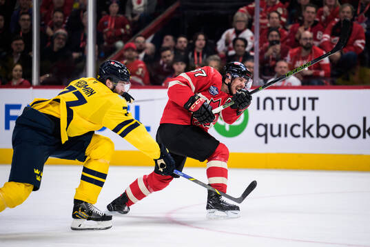 Victor Hedman of Sweden and Sidney Crosby of Canada