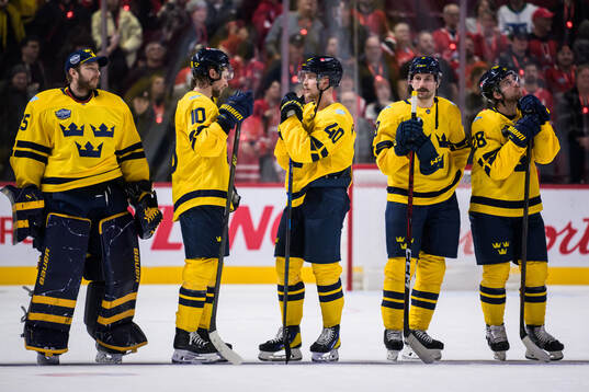 Goaltender Linus Ullmark, Adrian Kempe, Elias Pettersson,