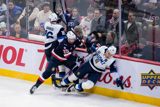 Aleksander Barkov and Mikko Rantanen of Finland in action