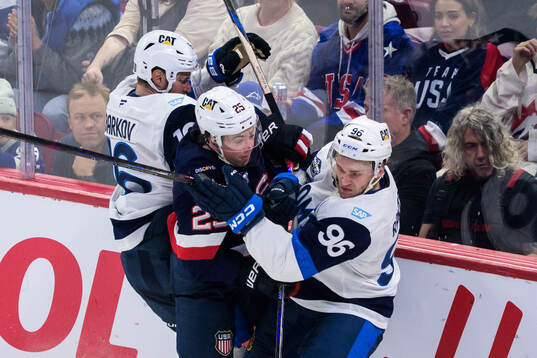 Aleksander Barkov and Mikko Rantanen of Finland in action