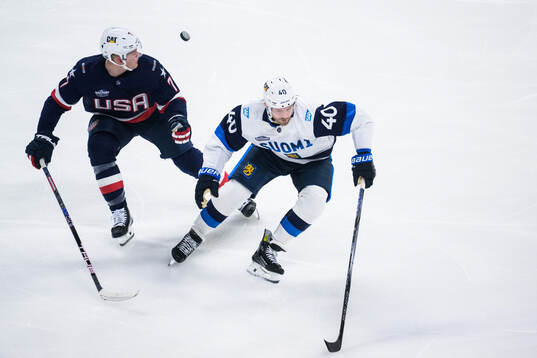 Brady Tkachuk of USA and Joel Armia of Finland