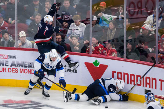 Brady Tkachuk of USA and Olli Määttä and Joel Armia of