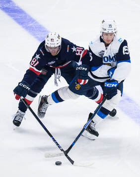 Kyle Connor of USA and Anton Lundell of Finland