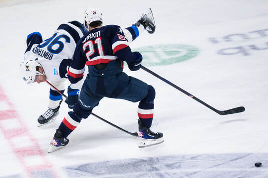 Mikko Rantanen of Finland and Dylan Larkin of USA