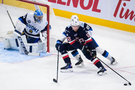 Goaltender Juuse Saros and Urho Vaakanainen of Finland are