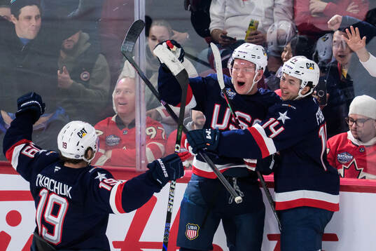 Matthew Tkachuk, Brady Tkachuk and Brock Faber of USA