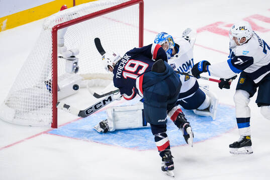 Matthew Tkachuk of USA scores the 6-1 goal behind