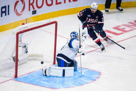 Auston Matthews of USA sees the 3-1 puck get in behind