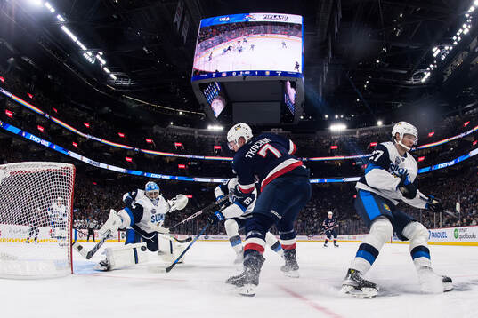Brady Tkachuk of USA scores 1-1 behind goaltender Juuse