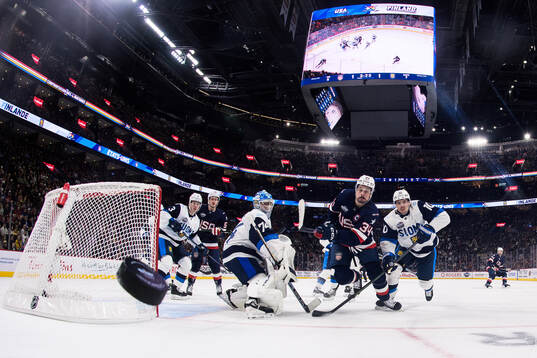 Goaltender Juuse Saros and Henri Jokiharju of Finland are