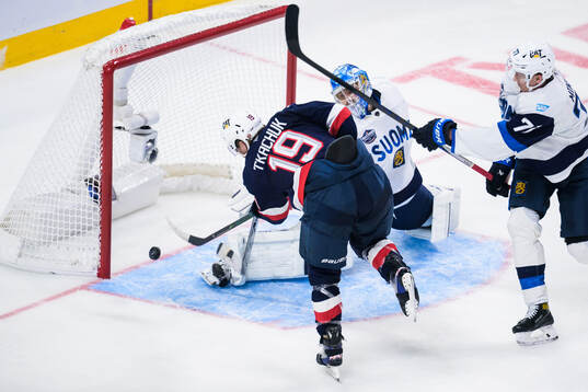 Matthew Tkachuk of USA scores the 6-1 goal behind