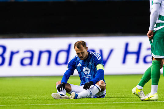 Magnus Wolff Eikrem of Molde looks dejected