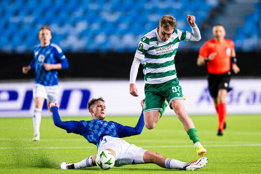 Valdemar Lund of Molde and Michael Noonan of Shamrock Rovers