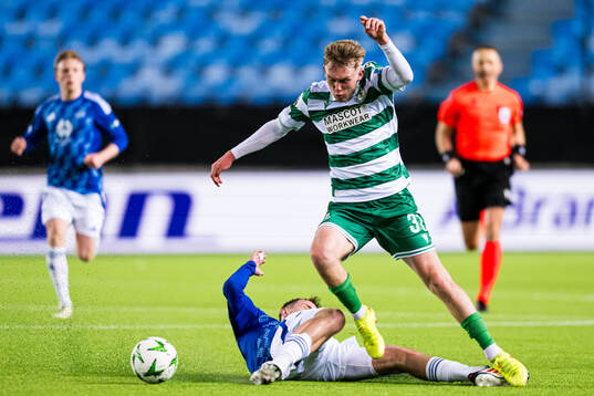 Valdemar Lund of Molde and Michael Noonan of Shamrock Rovers