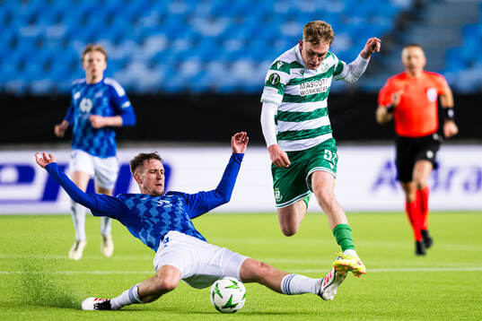 Valdemar Lund of Molde and Michael Noonan of Shamrock Rovers