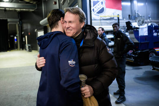 Erik Karlsson of Sweden hugs Johan Garpenlöv, former