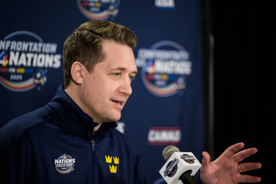 Head coach Sam Hallam of Sweden talks to media