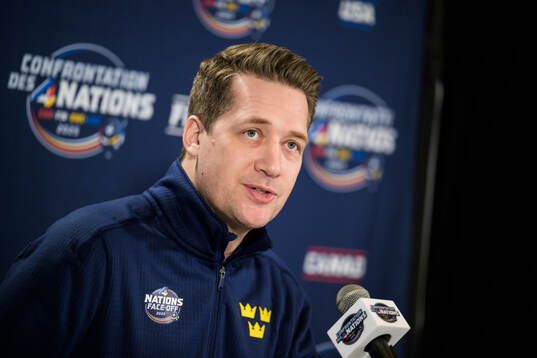 Head coach Sam Hallam of Sweden talks to media