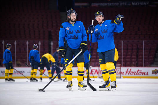 Mika Zibanejad and Lucas Raymond of Sweden at a practice