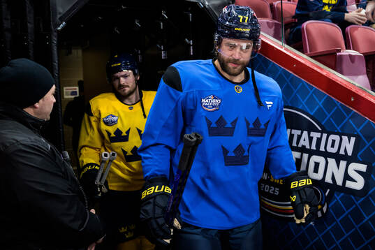 Rasmus Andersson and Victor Hedman of Sweden at a practice