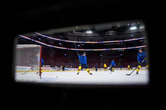Joel Eriksson Ek and Lucas Raymond of Sweden at a practice